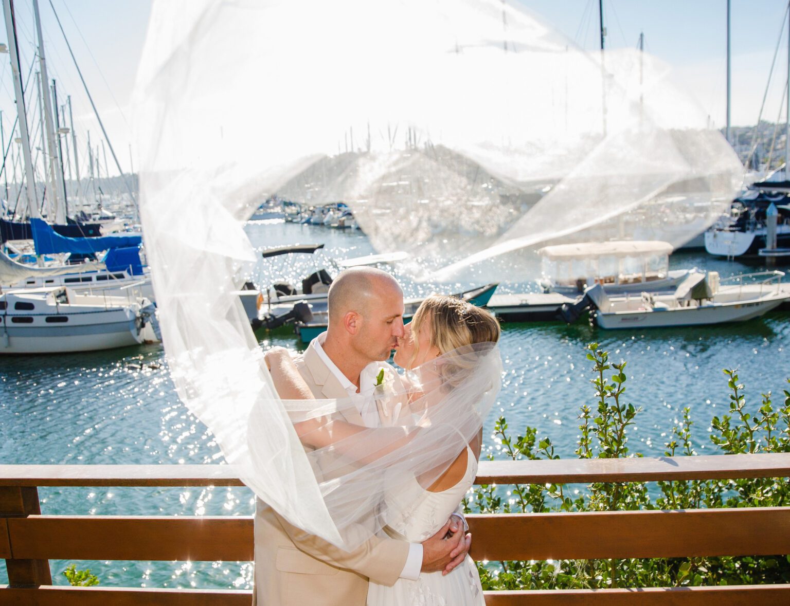 a bride and groom kissing