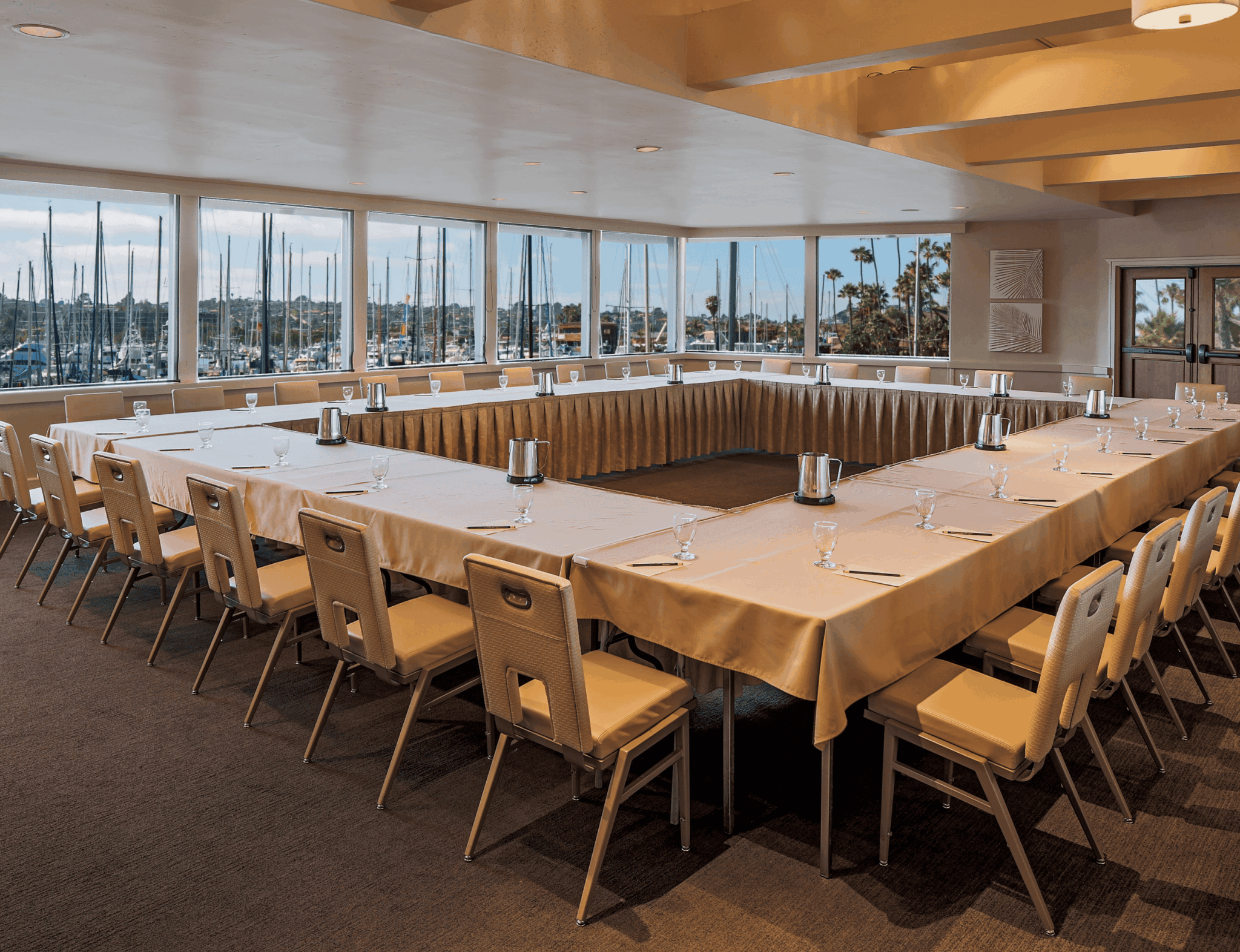 meeting room setup with marina views