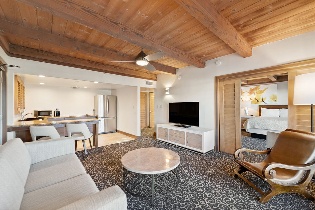 View of living room, and bedroom and kitchen