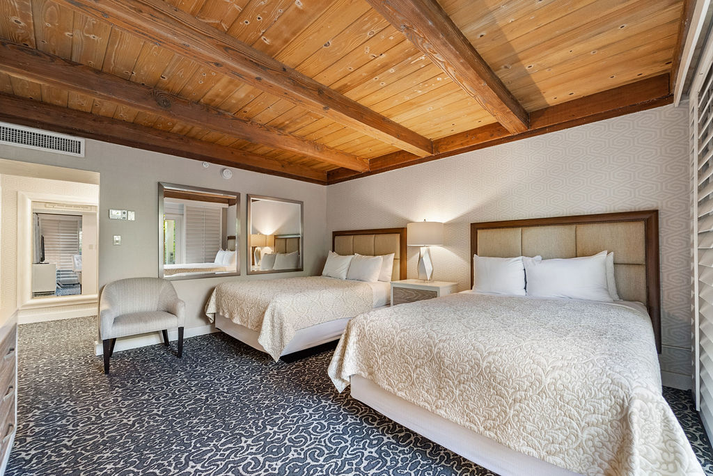 Two queen beds with Chair