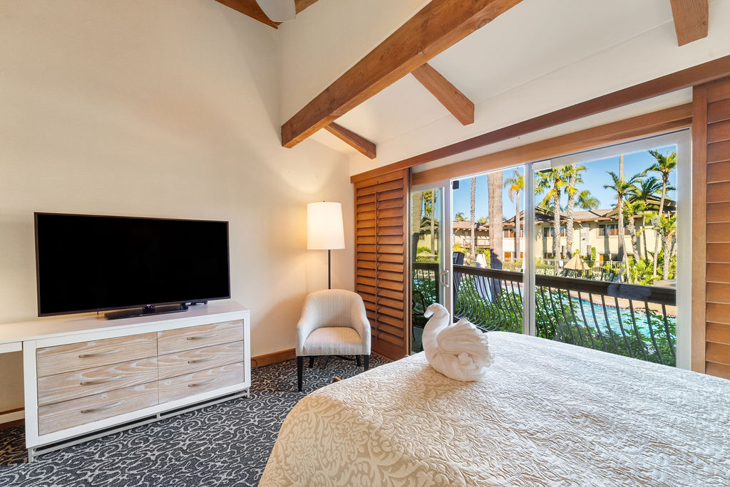 Guest bedroom of view out towards pool