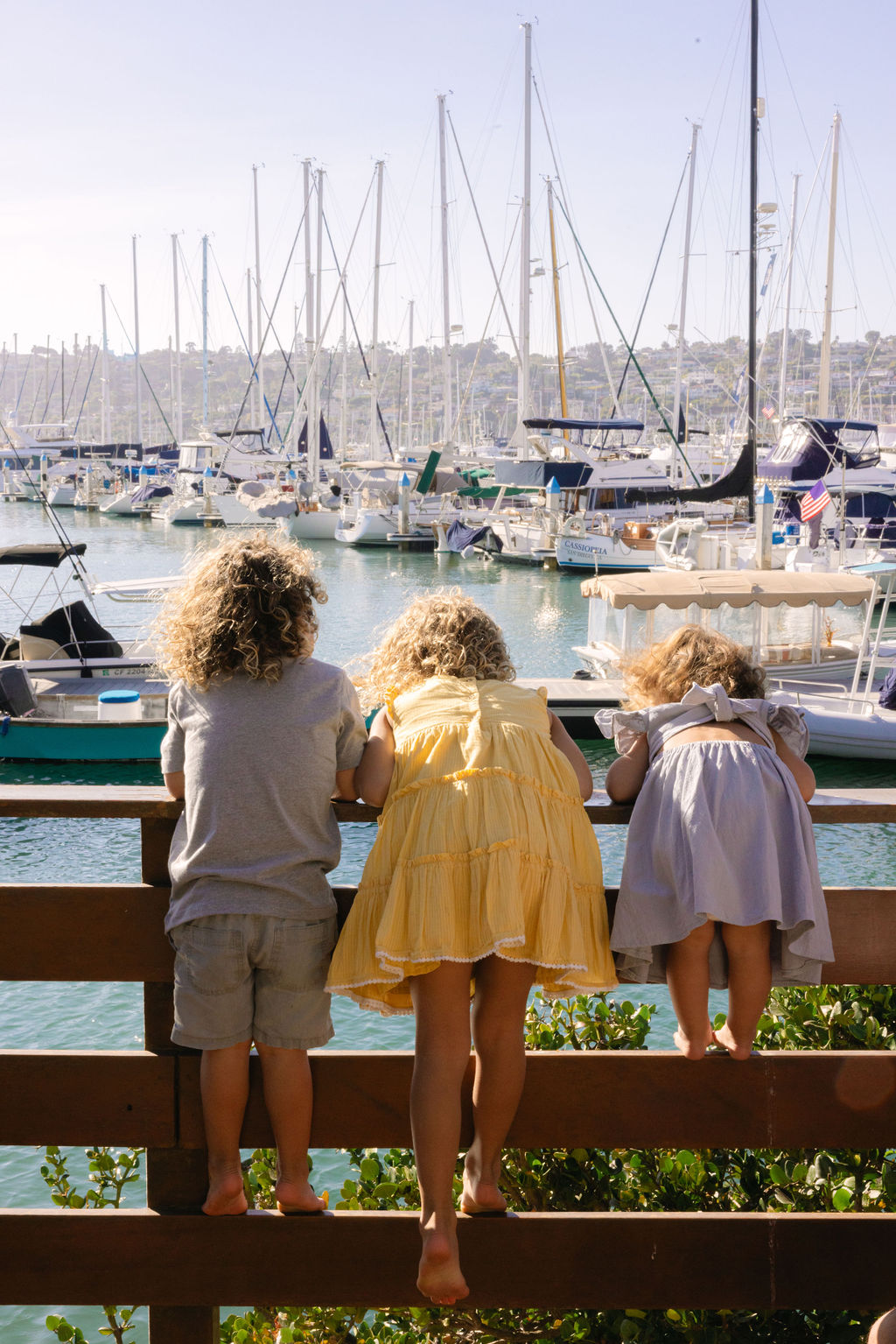 kids on the marina overlooking boats during San Diego Kids Free October