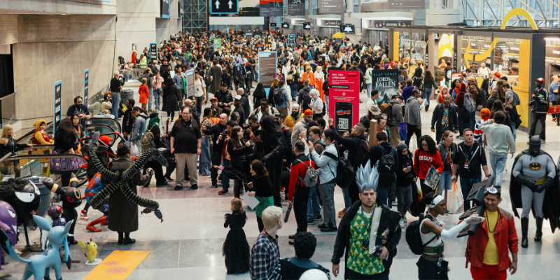 Crowds of people at a Comic-Con event dressed up as popular media characters