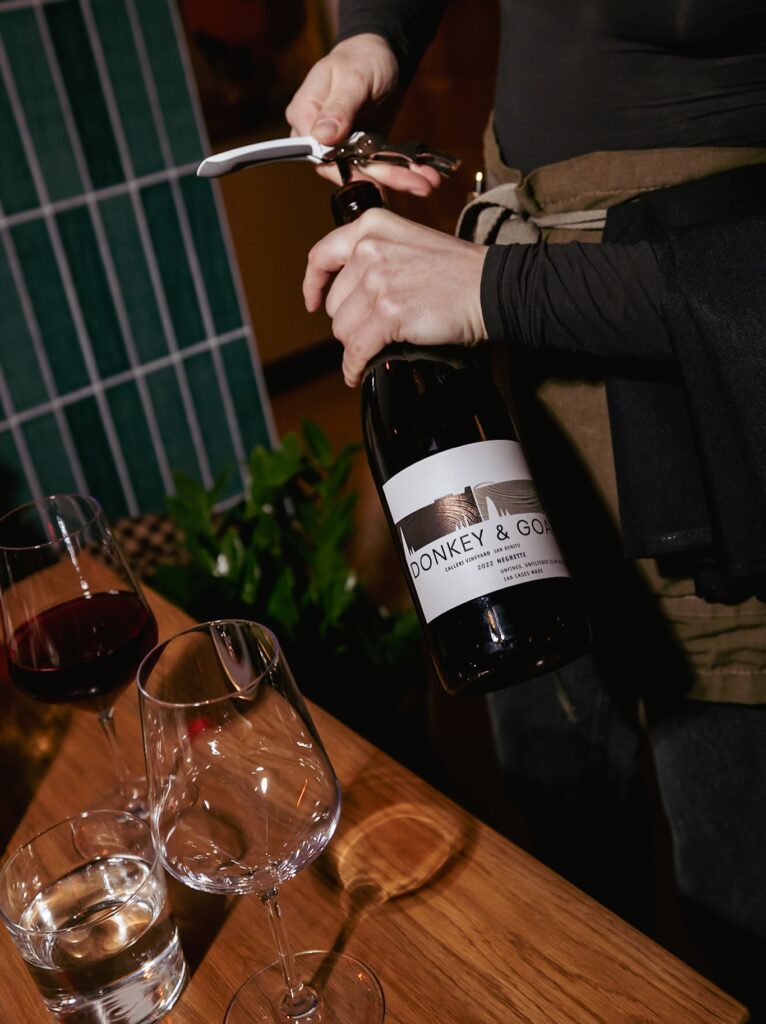 wine bottle being opened