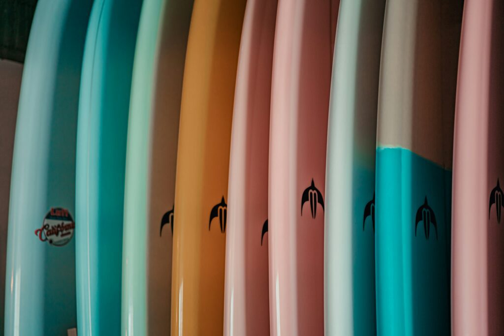 a row of colorful surf boards