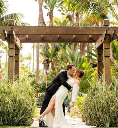 wedding couple under alter