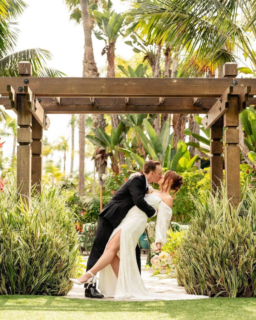 wedding couple under alter