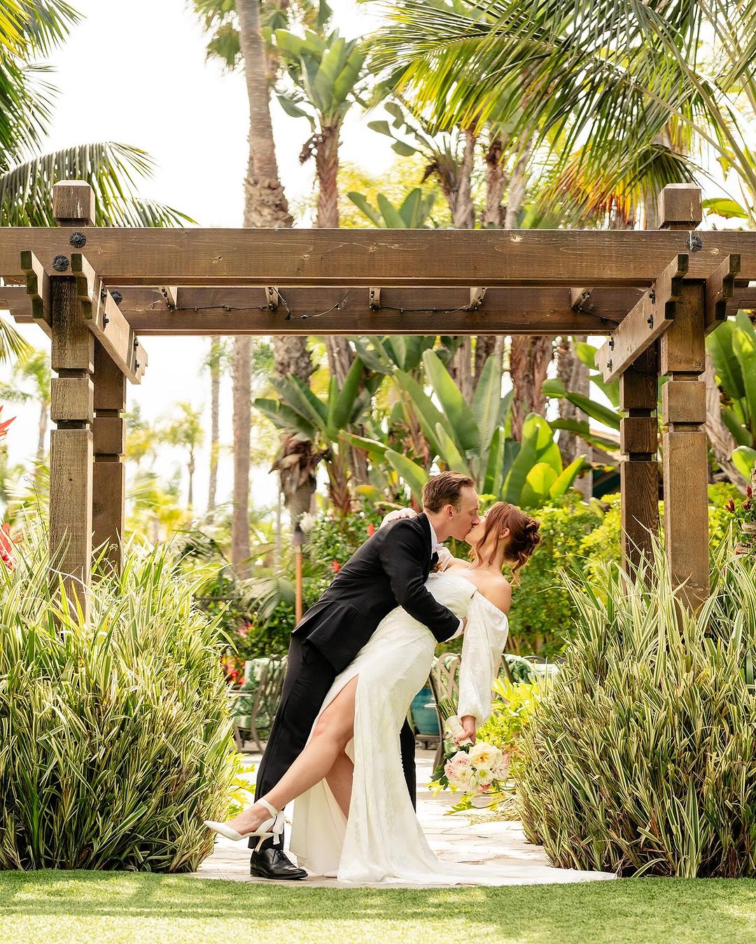 wedding couple under alter