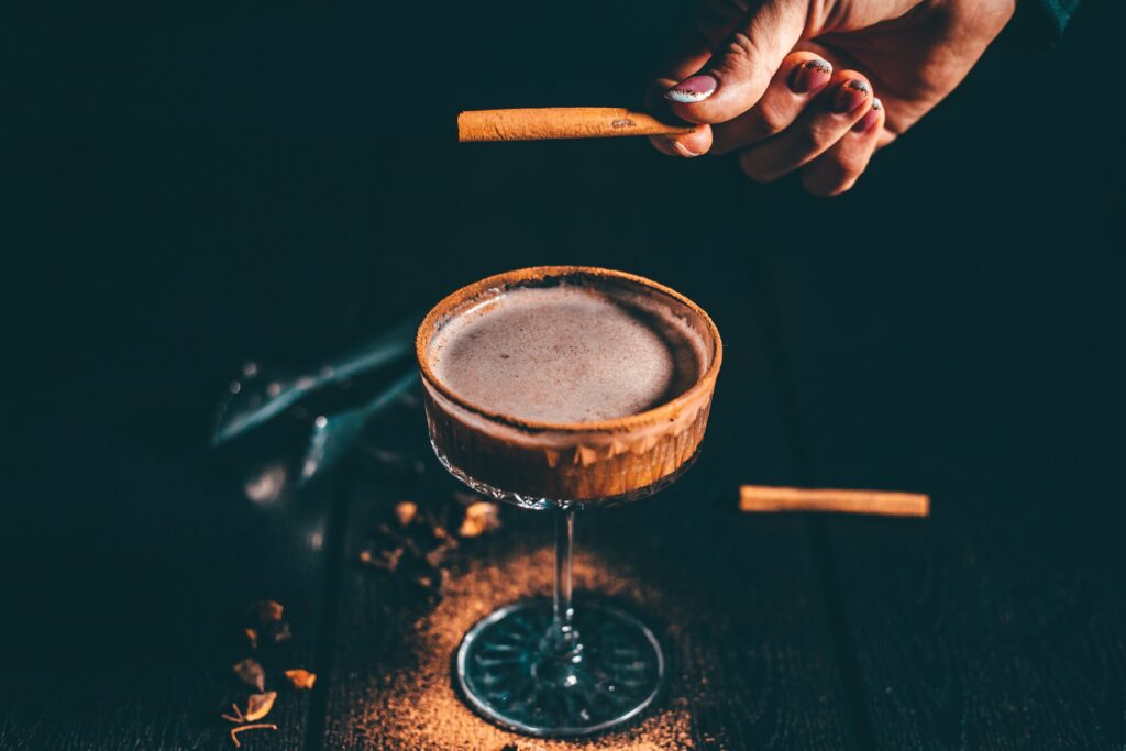 a cocktail with cinnamon