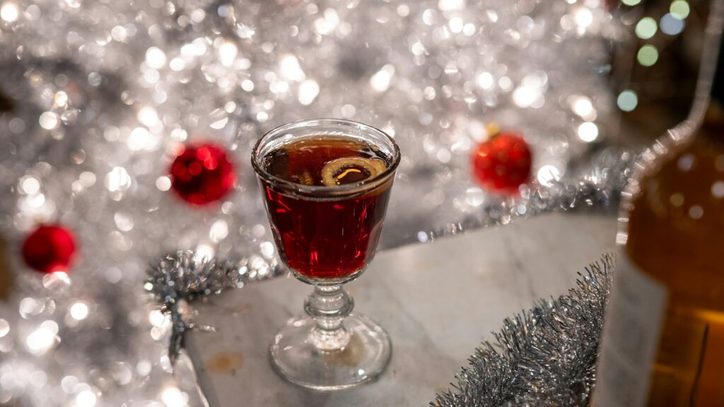 a cocktail with christmas deecorations