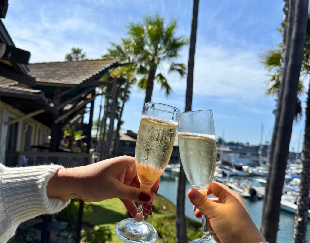 champagne glasses over looking the marina
